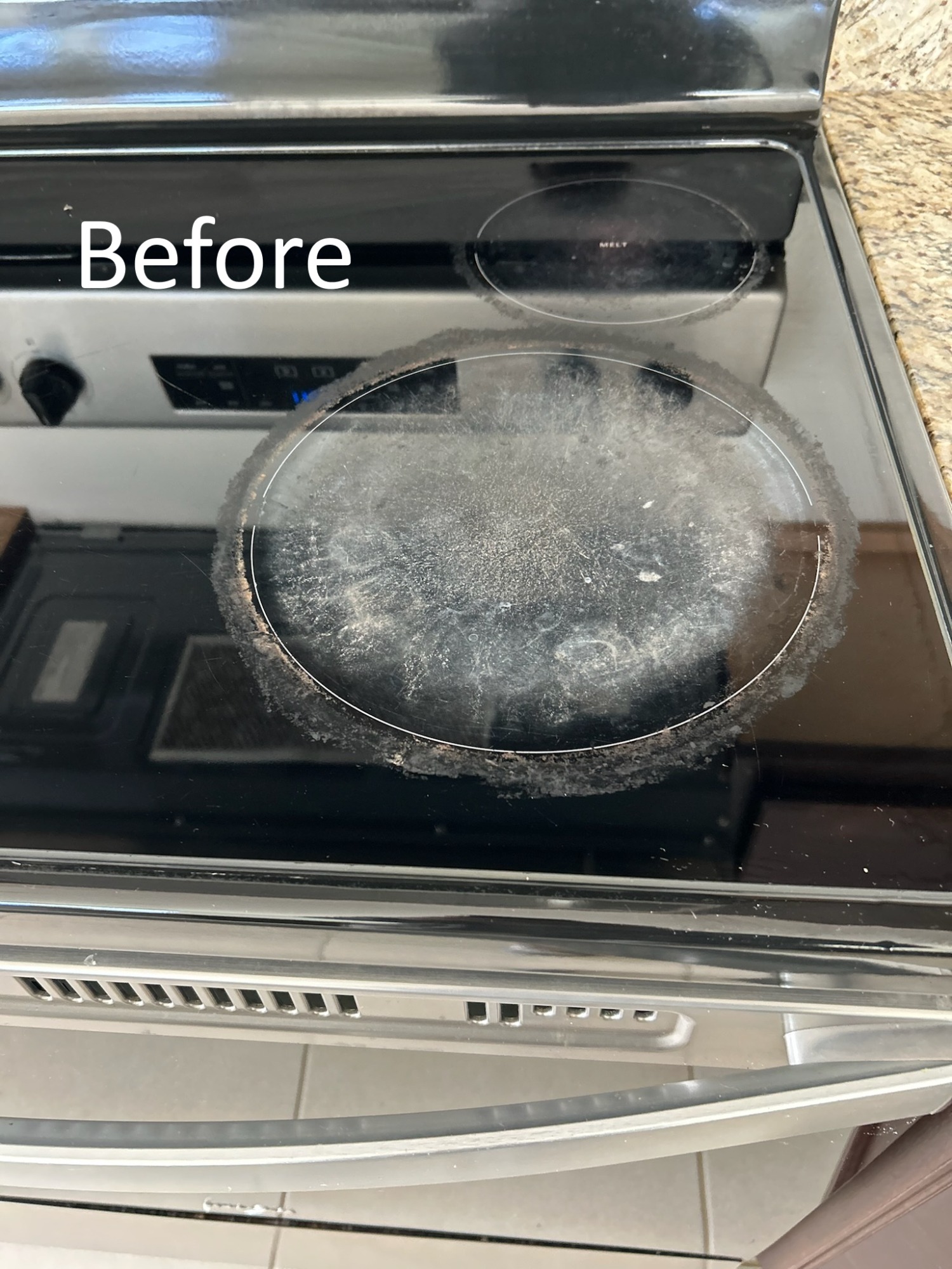 Dirty stovetop with grease and burnt residue before professional move out cleaning in Wesley Chapel FL