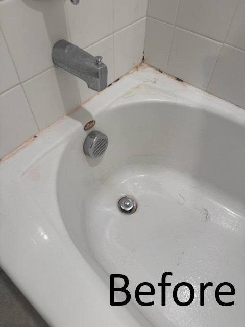 Dirty bathtub before professional bathroom cleaning service in Tampa FL