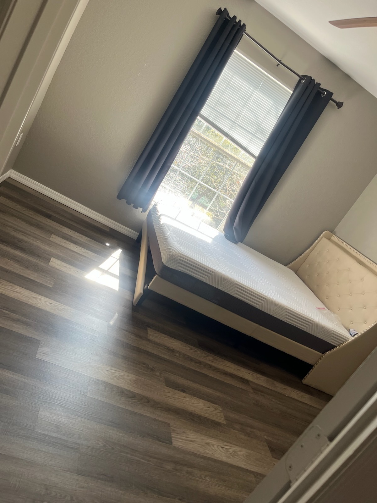 Bedroom cleaned, dusted, and vacuumed after professional house cleaning in Lutz