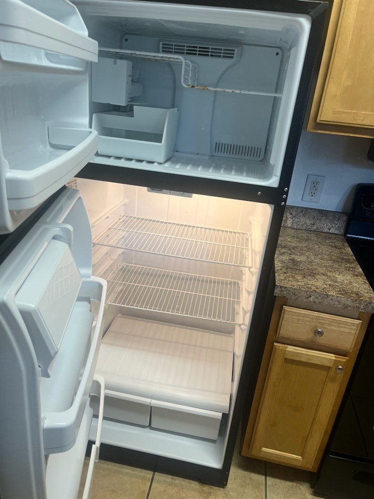 Refrigerator cleaned inside and out after professional house cleaning in Wesley Chapel