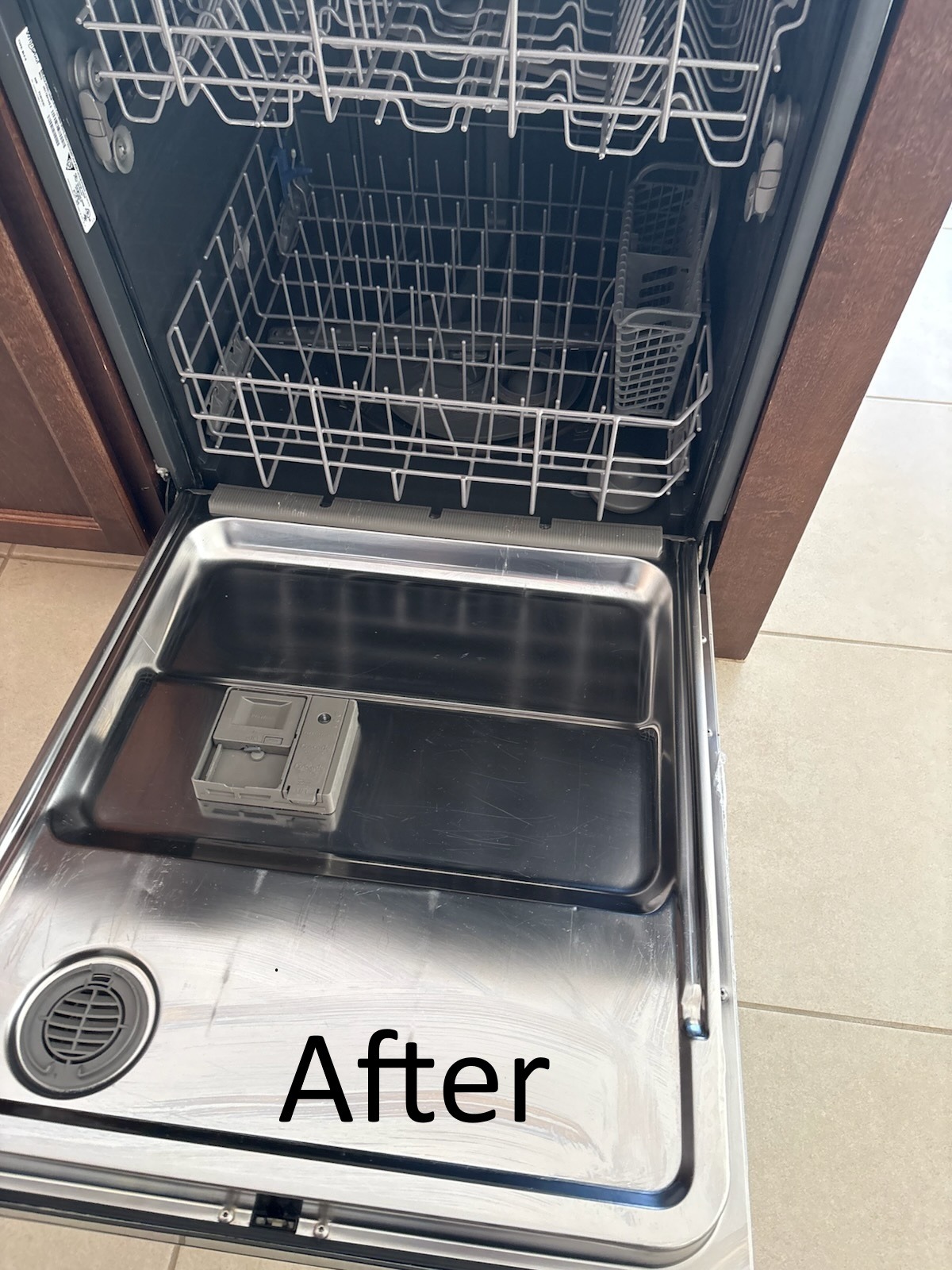 Cleaned and sanitized dishwasher interior after professional move out cleaning