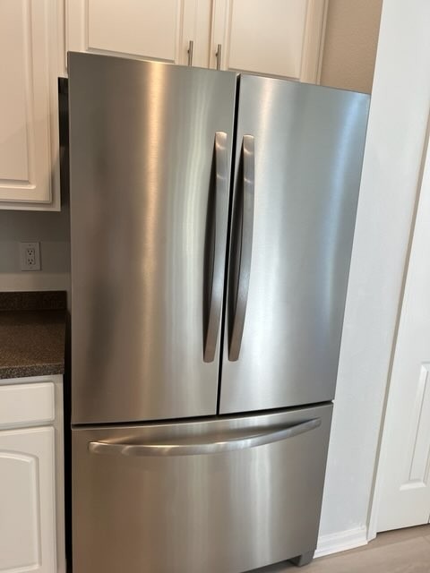 Exterior of refrigerator wiped down and polished after professional house cleaning in Tampa