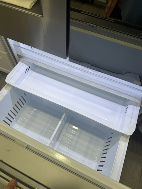 Freezer drawer cleaned and sanitized after professional house cleaning in Wesley Chapel
