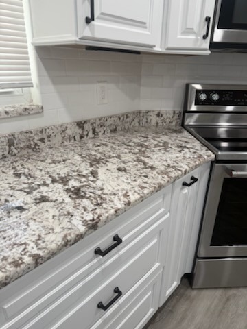 Cleaned kitchen cabinets and spotless countertops after professional house cleaning in Tampa