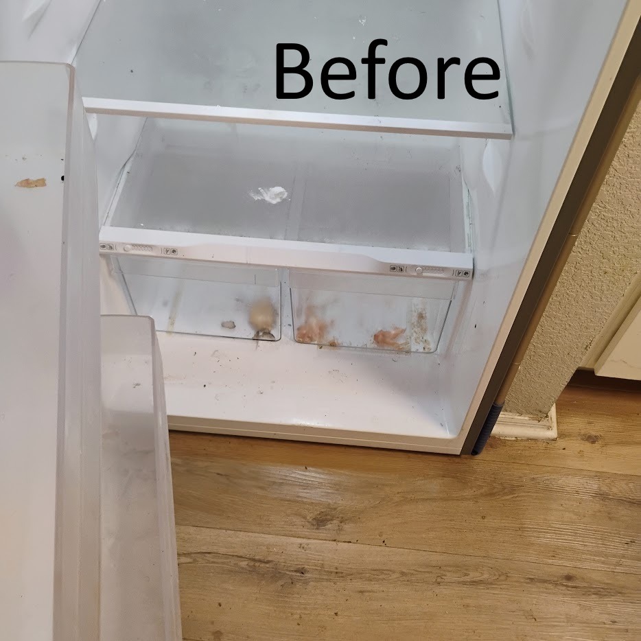 Apartment refrigerator with dirt and food prior to Evermaid Cleaners move out cleaning in Tampa, FL