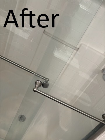 Clean glass shower doors in a Tampa apartment after professional cleaning